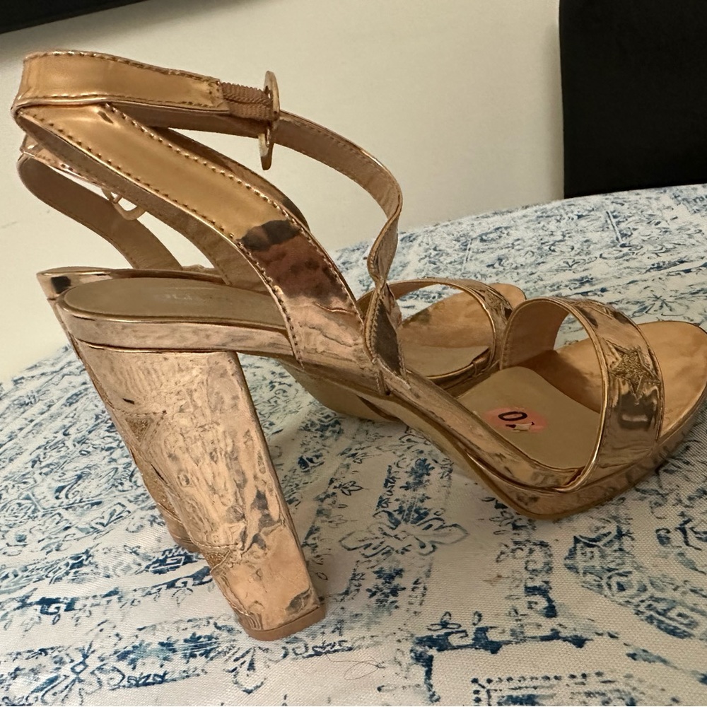 Gold high heels